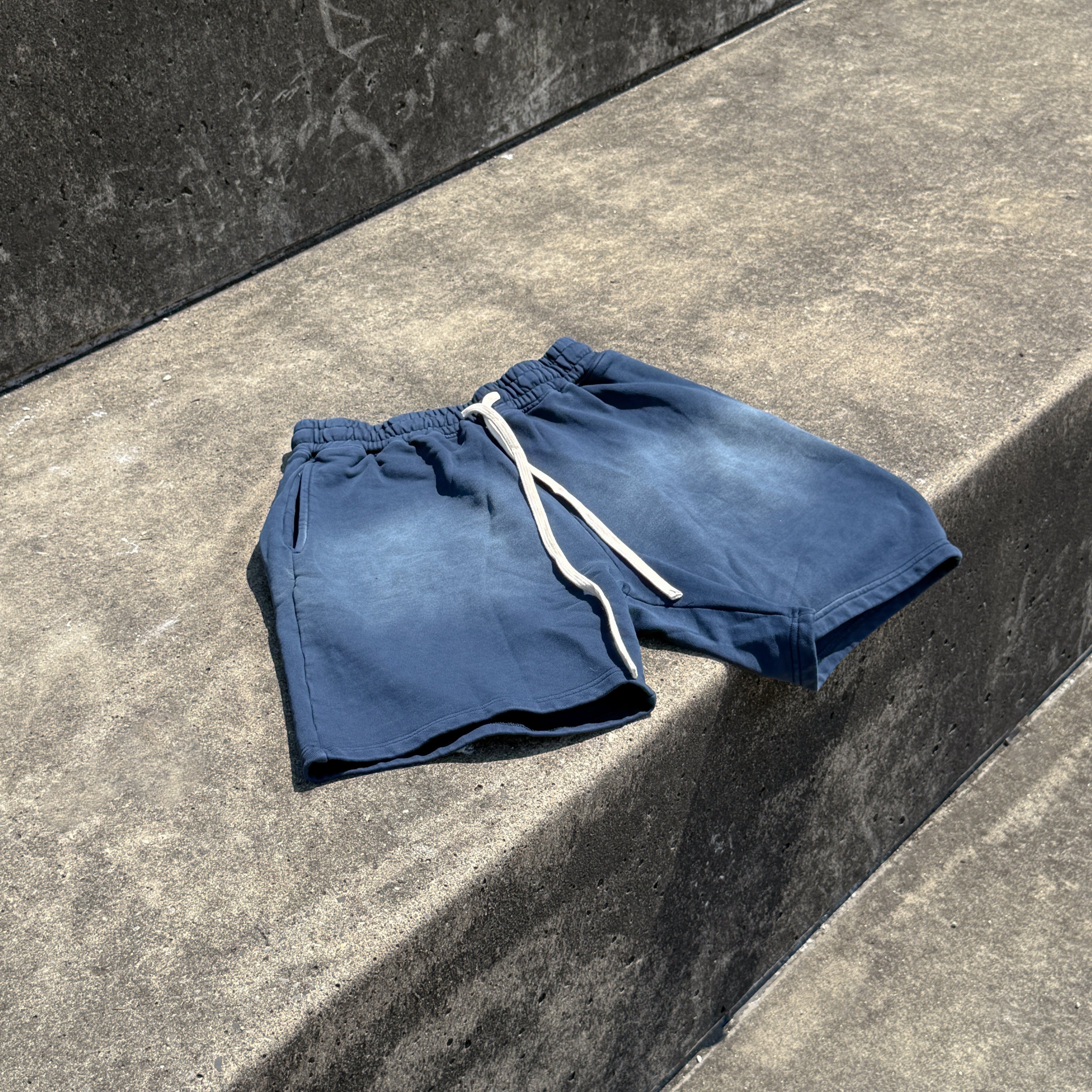 THE ACID WASH SPRAY SHORTS BLUE - Shoebuya Design