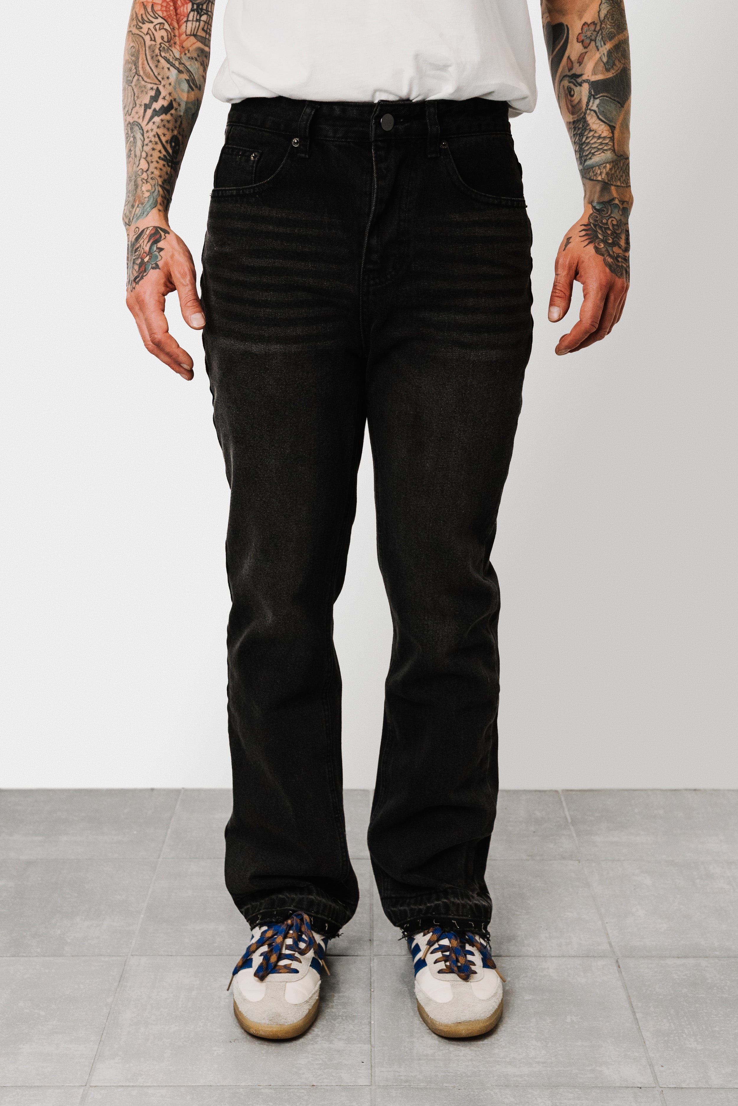 TORN AT THE BOTTOM BLACK JEANS - Shoebuya Design