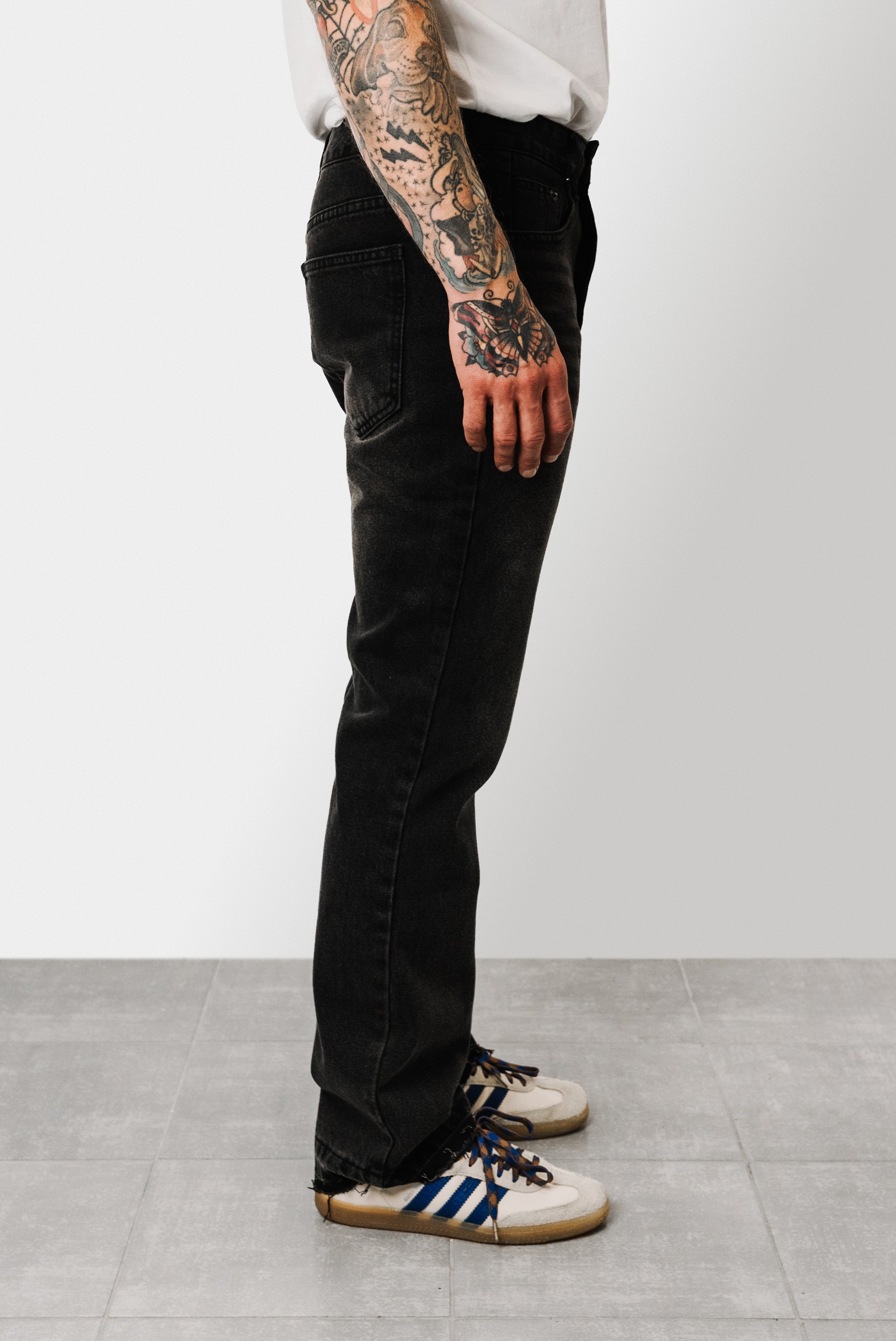 TORN AT THE BOTTOM BLACK JEANS - Shoebuya Design