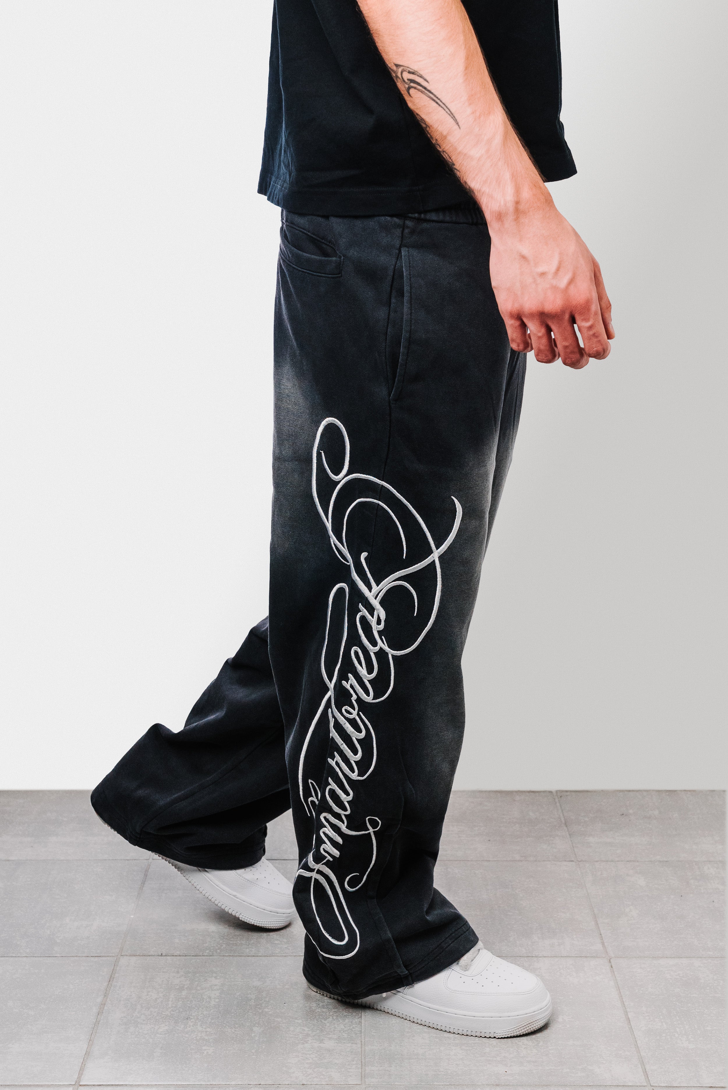 PEGASUS WASHED BLACK SWEATPANTS - Shoebuya Design