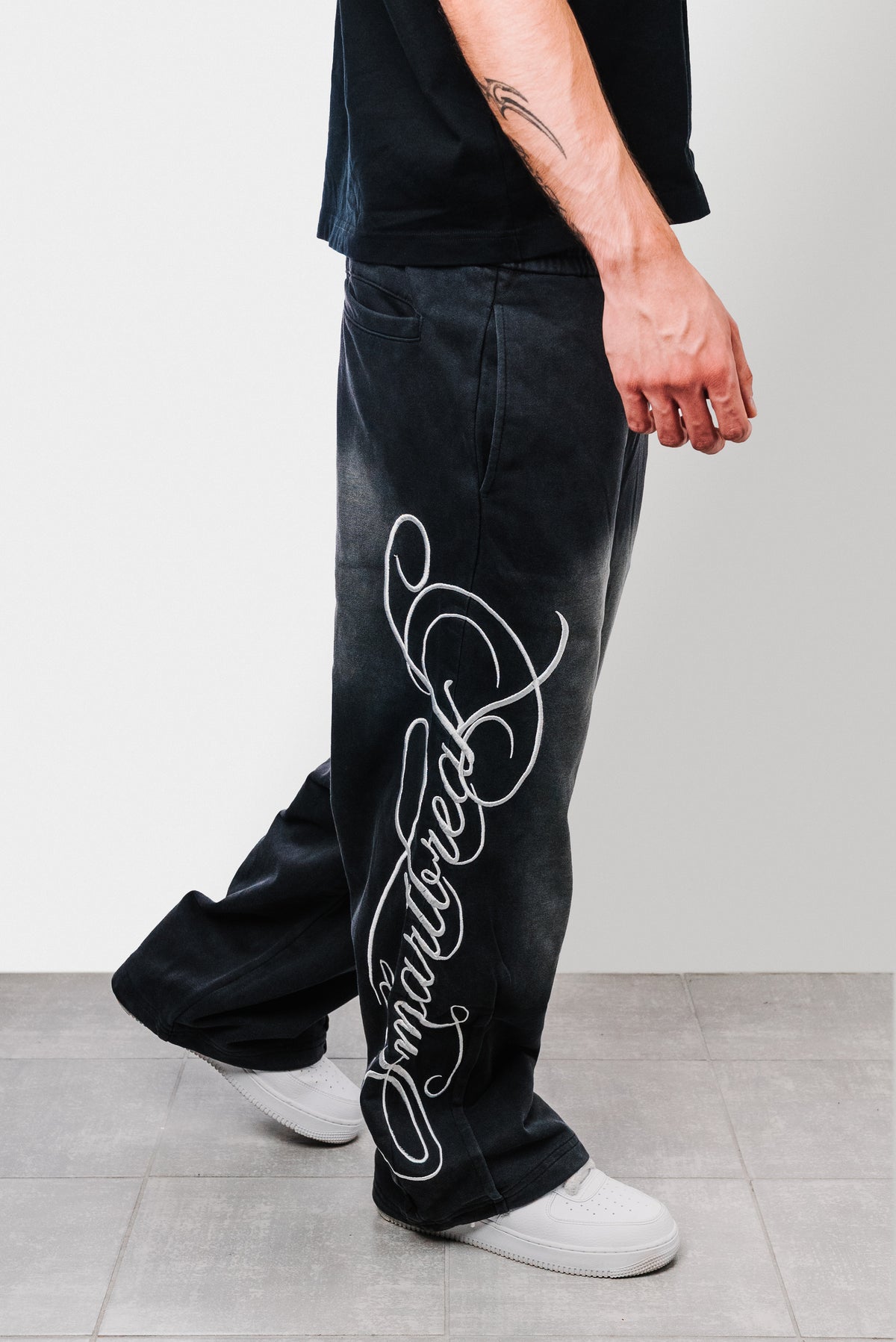 PEGASUS WASHED BLACK SWEATPANTS - Shoebuya Design